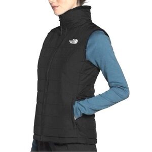 The North Face Women's Black Puffer Vest size Medium reversible!